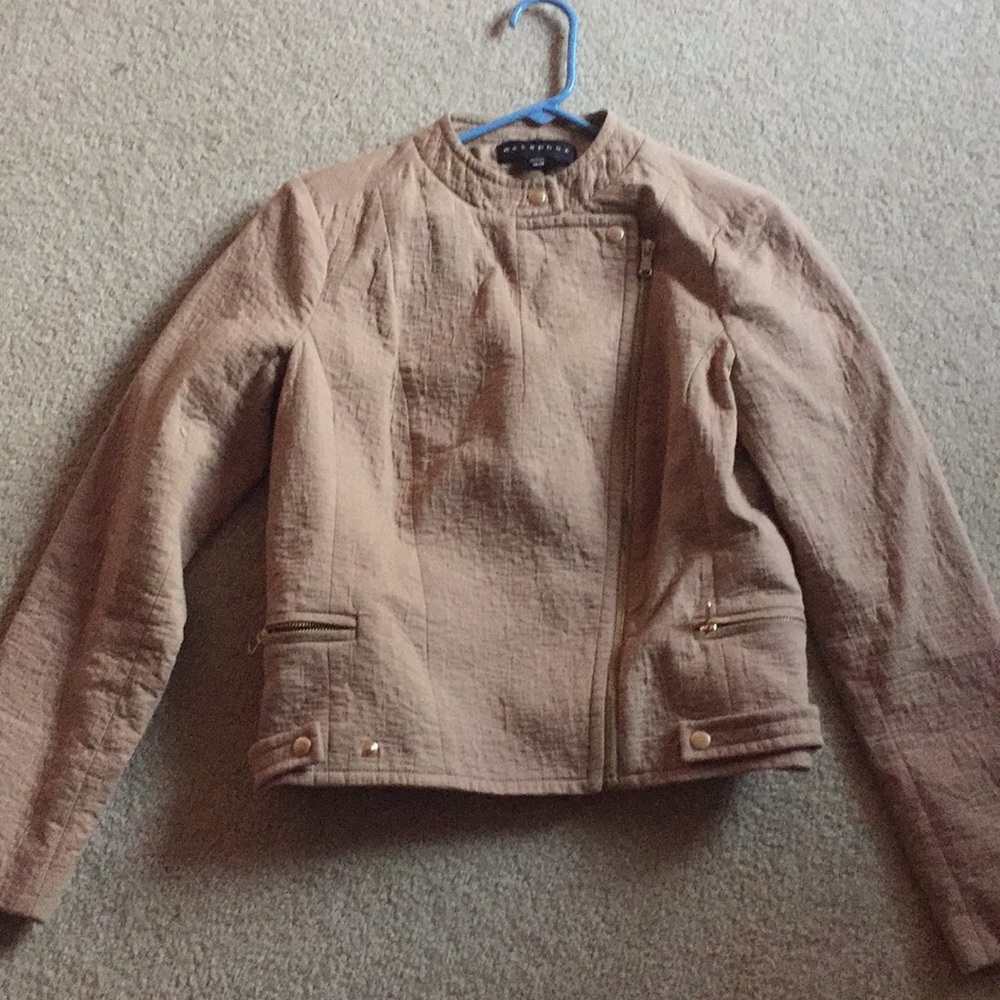 A tan women’s jacket